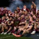 Queensland players and staff celebrate their 2025 Origin series win over New South Wales.