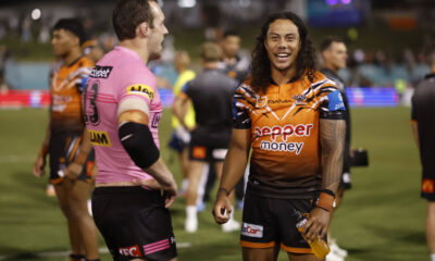 Wests Tigers' Jarome Luai, who is joining PNG Chiefs in 2028, with one of his former teammates.