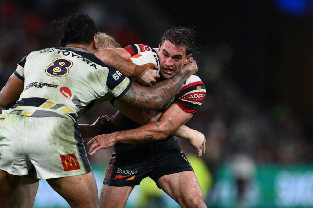 Connor Watson in action for the Roosters.