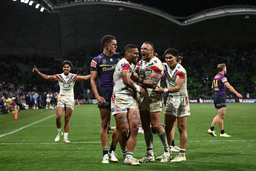 New Zealand Warriors celebrate a try against Melbourne.