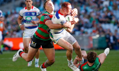 South Sydney Rabbitohs vs New Zealand Warriors. Rocco Berry is tackled.