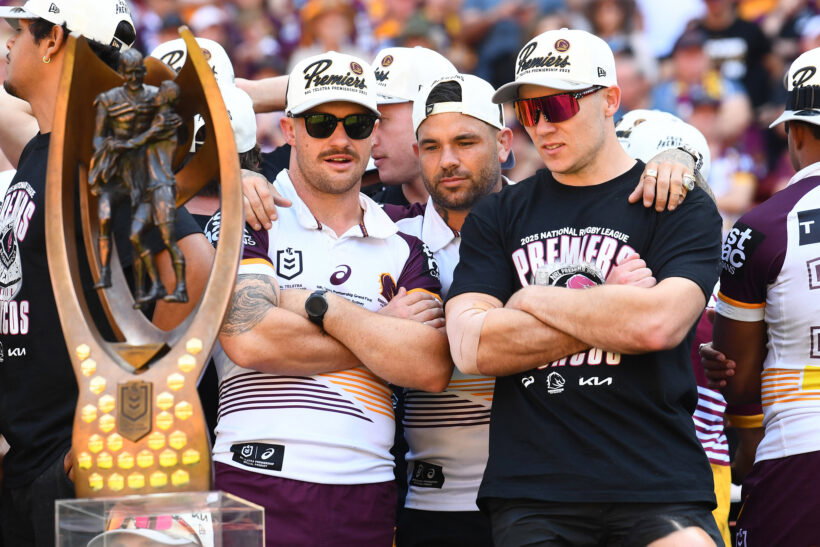 Billy Walters with Brisbane Broncos teammates Cory Paix and Adam Reynolds after winning the 2025 NRL Premiership.